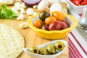 Ingredients for vegan cauliflower crust pizza.