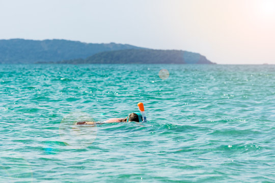 Boy does snorkeling on Thailand islands.
