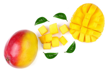 Fototapeta premium Mango fruit and slices decorated with leaves isolated on white background with copy space for your text. Top view