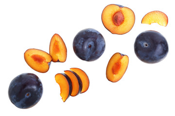 plums isolated on a white background with copy space for your text. Top view. Flat lay pattern