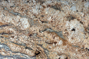 Natural beige granite with interesting patterns on the surface is called Golden cascade