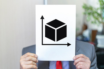 Anonymous businessman holding A4 paper sheet like a mask with a cube and measurement axis icon. Dimension business concept.
