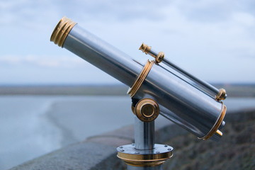 Telescope tower viewer chrome gold mont saint michel france tourism ocean