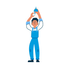 Electrician or worker in overalls install or change a light bulb.
