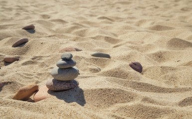 Fototapeta na wymiar sand on the beach, pebble stones 