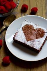 Raspberry Brownie, Valentine's Day, on wooden background
