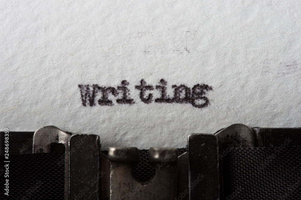 Fototapete close up image of typewriter with paper sheet. writing text
