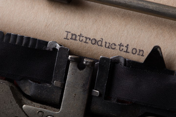Vintage inscription made by old typewriter, introduction - obrazy, fototapety, plakaty