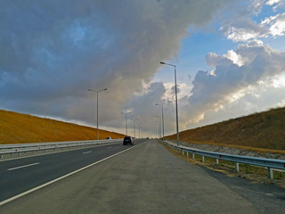 Fototapeta na wymiar New road to the Crimea. Damper and mast lighting, new markup.