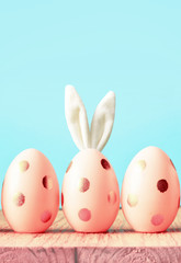Easter eggs with bunny ears. Minimal concept.