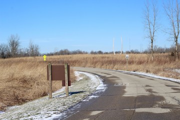 In the middle of the curved road on a bright sunny day. © Al