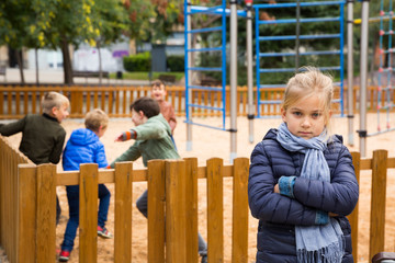 Offended girl on playground