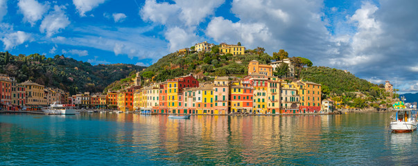 Colorful houses and yachts in spectacular bay harbor of Portofino in the province of Genoa, Italy