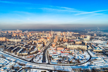 Aerial view of the modern city district. Winter, sunny day