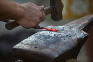 Medieval traditional blacksmith for metal forging