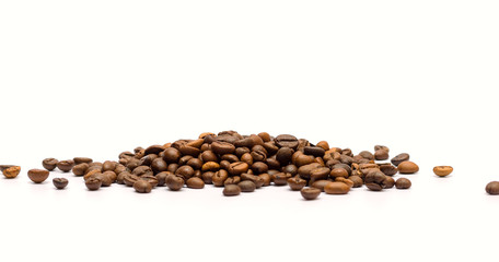 Coffee grains on a white background.