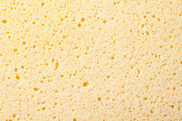 Sponge foam yellow pattern texture.
