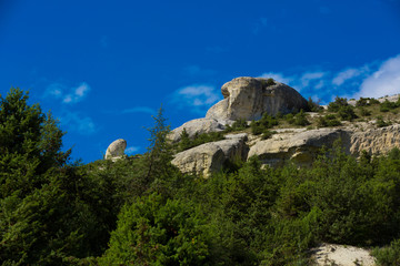 Mountain landscape with blue sky and clouds