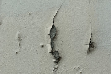 Cracked wall and paint. Background cracked paint texture.