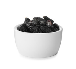 Bowl with raisins on white background. Healthy dried fruit