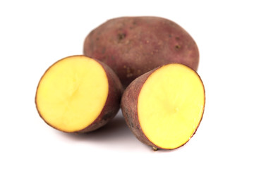 red sweet large potato close up isolated on white background