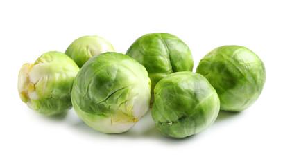 Fresh tasty Brussels sprouts on white background