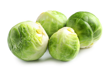 Fresh tasty Brussels sprouts on white background
