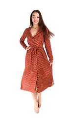 Portrait of beautiful young woman in stylish dress on white background