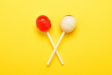 Lollipop on a yellow background. Space for text or design.