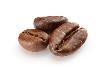 Coffee beans. Three roasted coffee beans macro view, close up, isolated on white background.