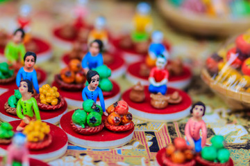 Fototapeta na wymiar Cute Clay Dolls of Thai Culture, Selective Focus
