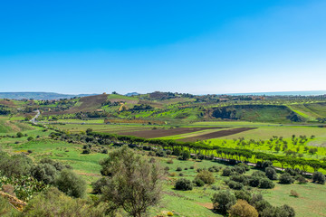 Naklejka premium Scenic landscape of Sicily. Sicilian countryside landscape. Hills skyline in sunny day.