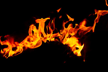 Fototapeta premium Flame of fire on a black background