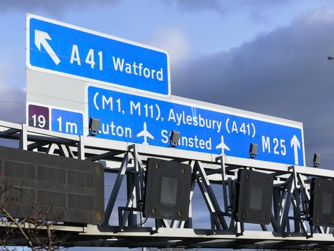 M25 Motorway signs, near Junction 19 in Hertfordshire, UK