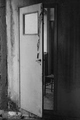 creaking door in old abandoned house interior