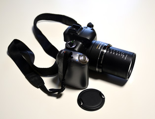 Digital camera with extended lens. Isolated
