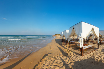 Morning sandy beach, Puglia, Italy