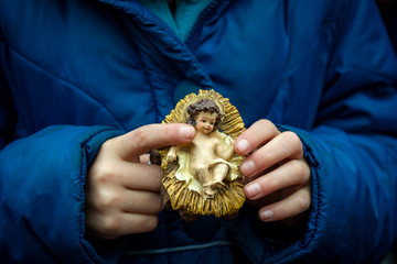 Vatican City, December 11, 2016: Children take Baby Jesus from their Nativity Scene (Tradition...