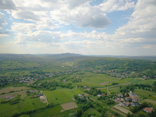 Panorama of the mestain near the town of Jaslo in Poland from a bird's eye view. Aerial photography of landscapes and settlements. Urbanization of the country. Living environment of people