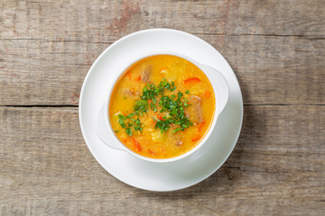 Red lentil soup with vegetables. The view from the top. Copy-space.