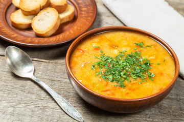 Red lentil soup with vegetables. The view from the top. Copy-space.