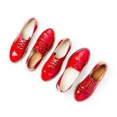 Stylish female spring or autumn shoes in red colors. Beauty and fashion concept. Flat lay, top view
