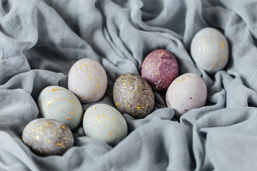 Stylish gray, violet and blue Easter eggs. Homemade naturally dyed Easter eggs