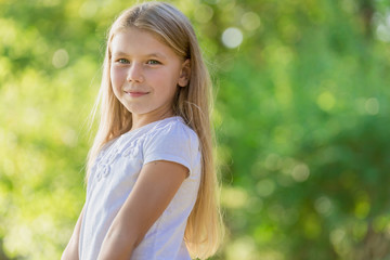 Fototapeta premium Little girl outdoor in the park