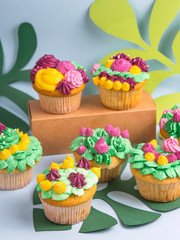 Creative dessert muffin with colorful cream decoration