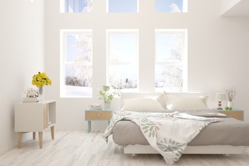White stylish minimalist bedroom with winter landscape in window. Scandinavian interior design. 3D illustration