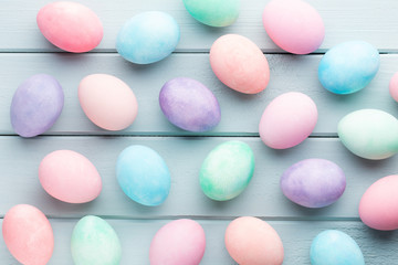Pastel Easter eggs background. Spring greating card.