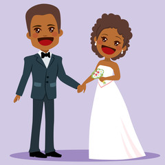 African American couple standing posing happy on wedding day holding hands
