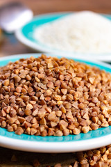 Healthy diet superfood buckwheat groats and flour used for making delicious pasta, noodles, pancaces and kasha in many countries.