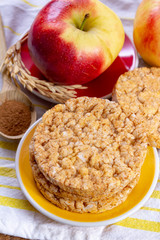 Round rice crackers made with apple and cinnamon, healthy snack for breakfast, lunch and school food